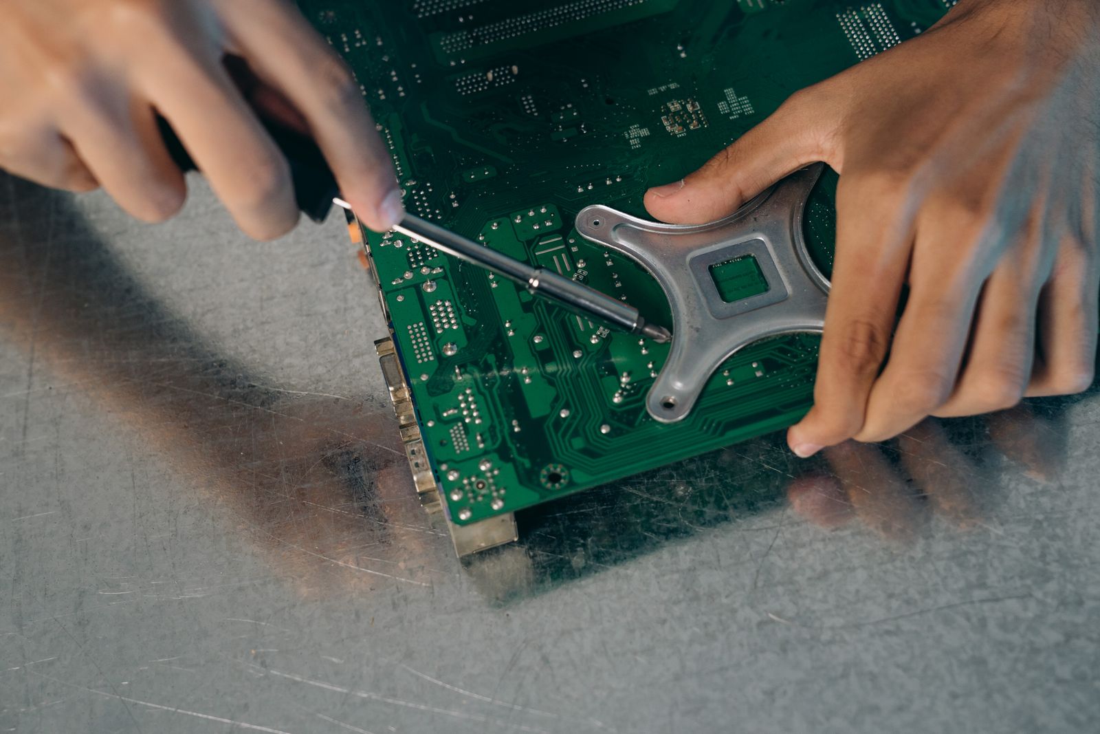 Electronics engineer working on a circuit board for embedded and OEM integration